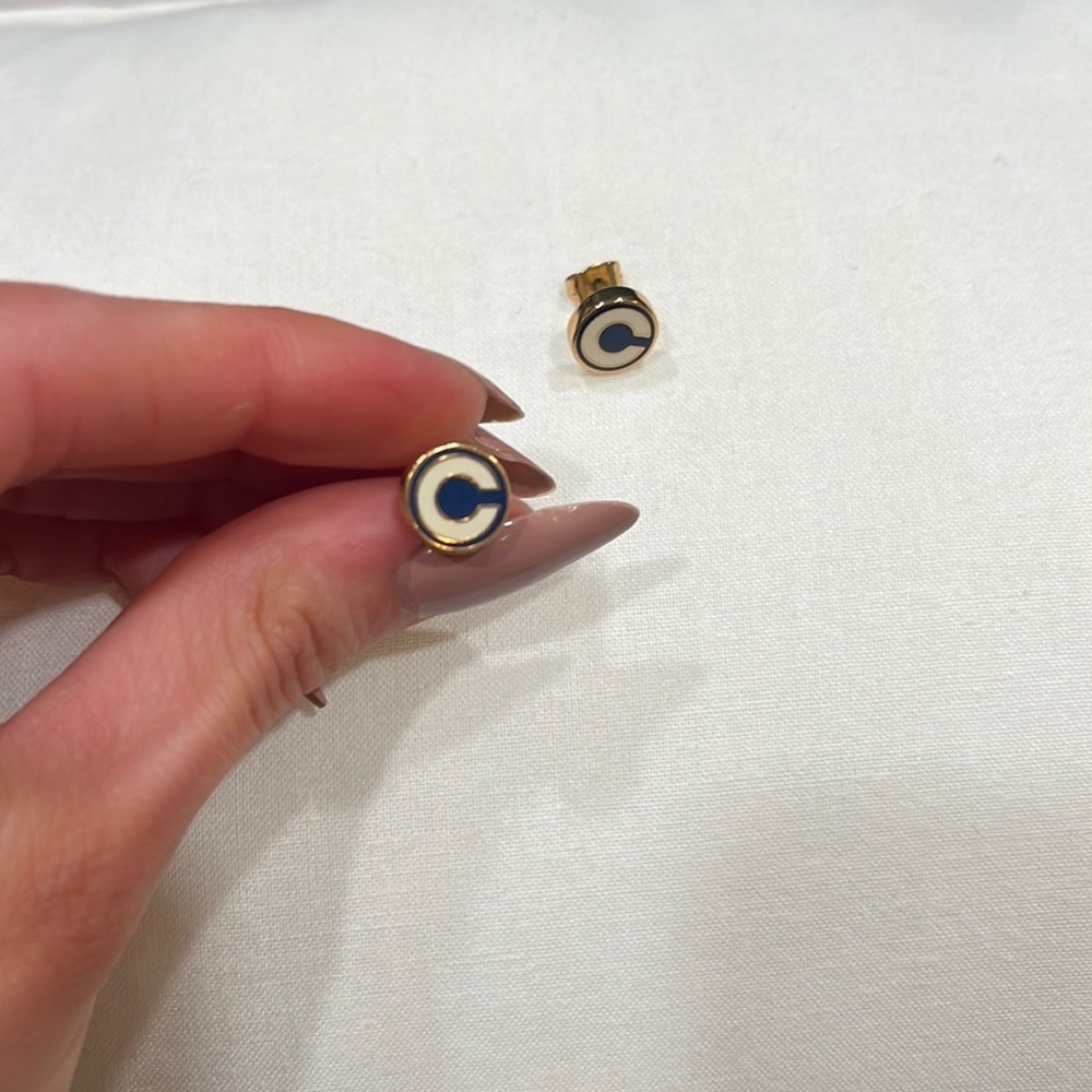 {COACH} gold tone stud earrings